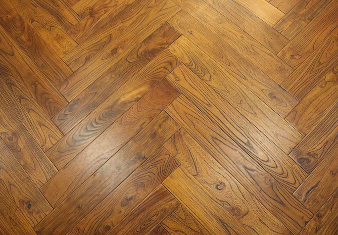 robinia herringbone flooring - golden teak stain